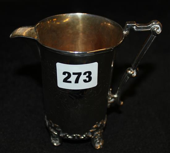 Engraved silver cream jug